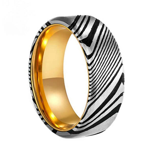 A Damascus steel tungsten men’s wedding ring showing off exquisite yellow gold sleeves.